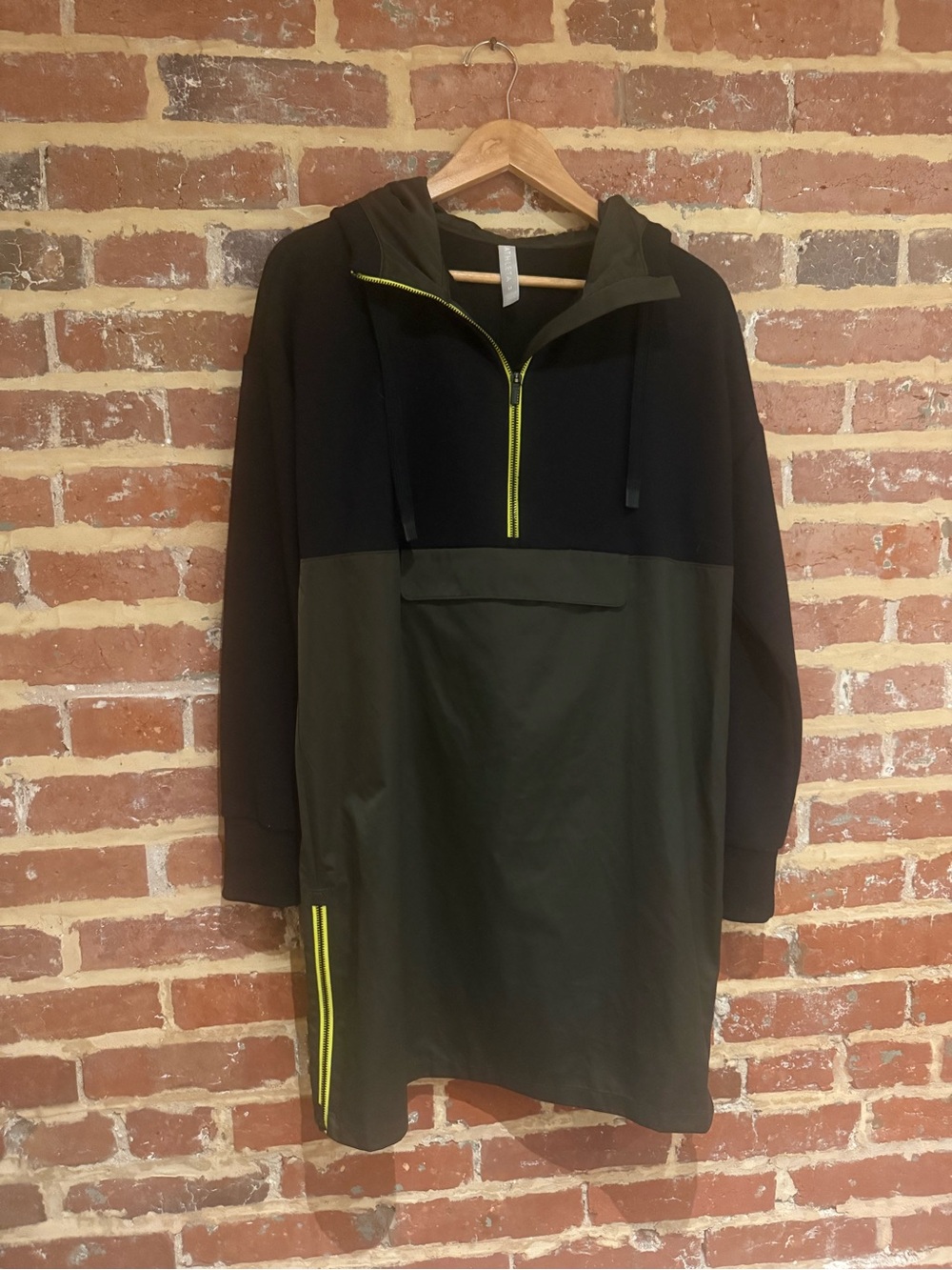 Athleta Black and Olive Green Half-Zip Hooded Windbreaker with Neon Trim